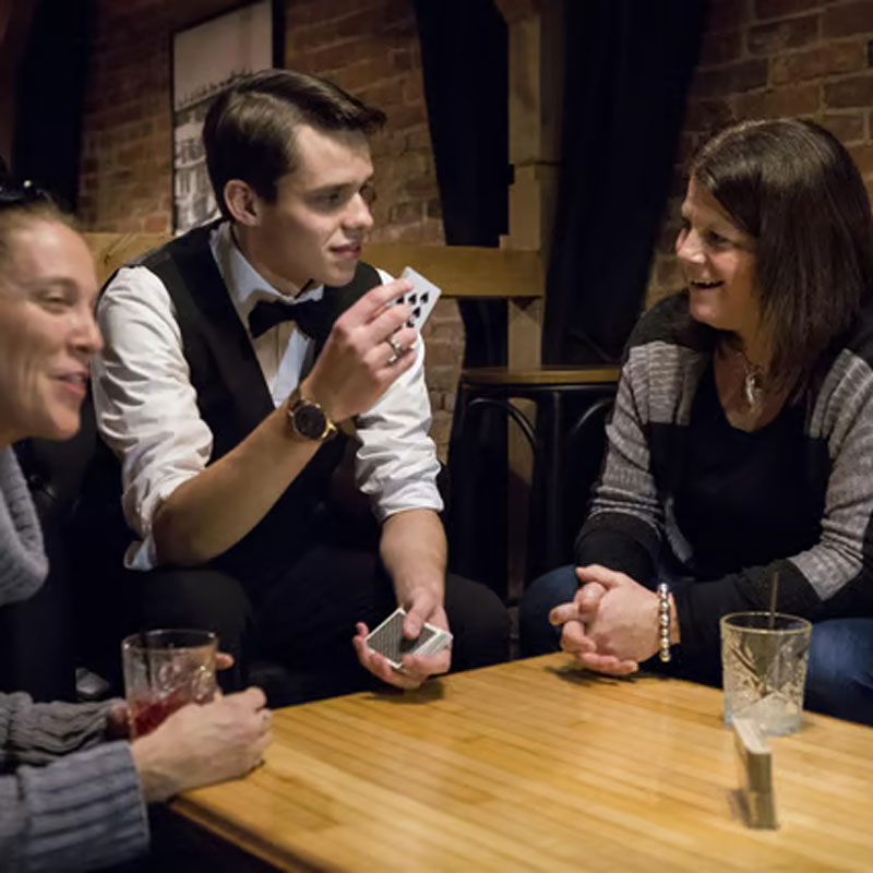 A magician performing a card trick